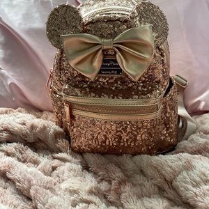 Rose gold Minnie lougefly backpack